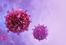 An illustration of HIV virus cells.