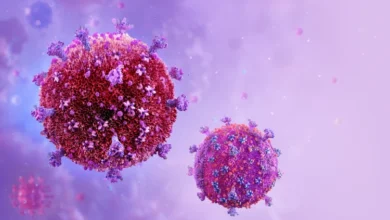 An illustration of HIV virus cells.